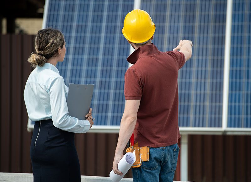 contractor-showing-installed-solar-panels-2021-09-24-03-45-07-utc
